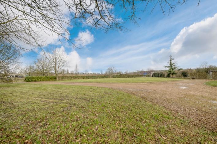 driveway and sits in a quiet corner of this sought after village.
