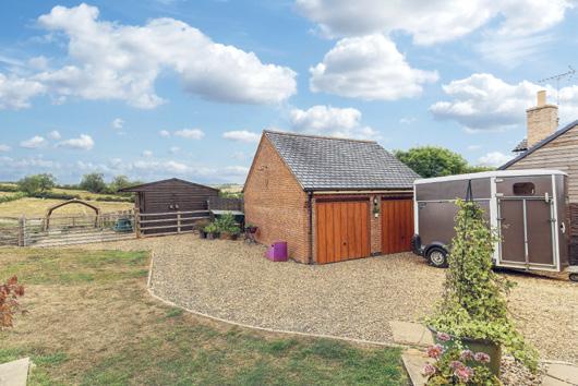 Property The property is a modern bungalow completed in 2011 of brick construction under a slate roof set within a 2.3 acre plot. The accommodation extends to approximately 1,125 sq ft (104.