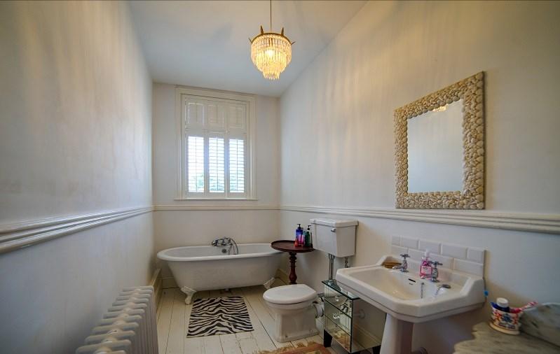Bathroom With double doors, freestanding white rolled top bath, Savoy white w.c and wash hand basin. Kitchen 1 With double opening doors, fitted units and sink unit.