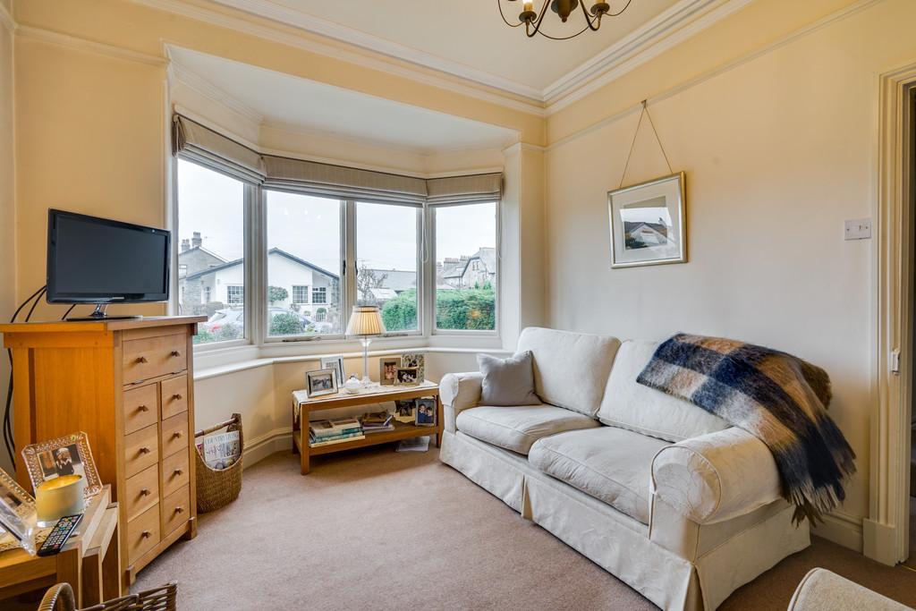Living Room Description: This attractive stone and slate terraced house enjoys a spacious well planned layout with a most welcoming entrance hall, two living rooms and an excellent fitted and