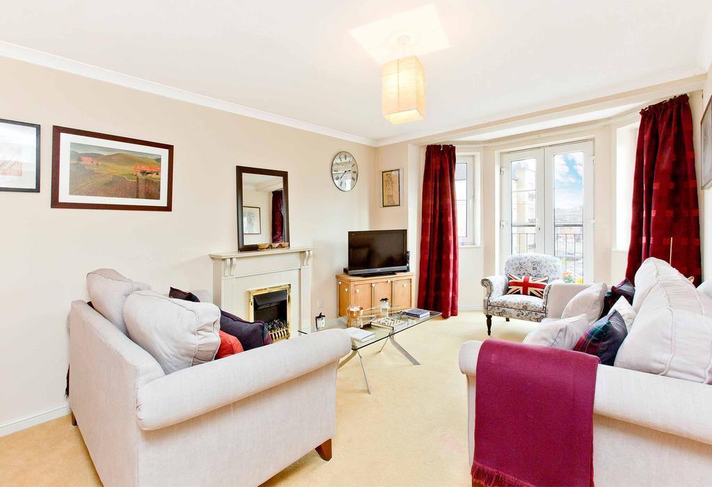 Presenting an immaculate city home in a prime location, this modern two-bedroom third-floor flat lies just minutes walk from the delightful Pilrig Park and Leith Walk, with its excellent transport