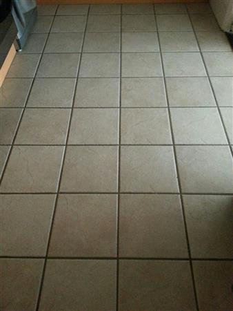 Flooring (Kitchen) Cream stone.