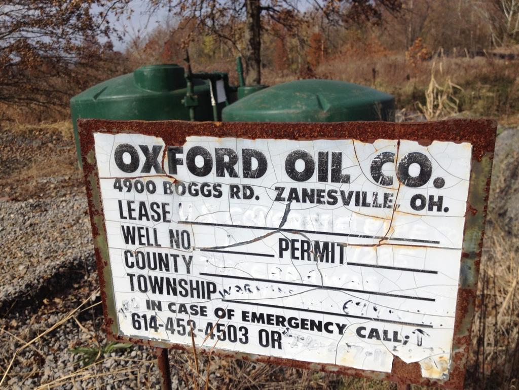 Photograph 19: Oil well information Photograph 20: Northeastern