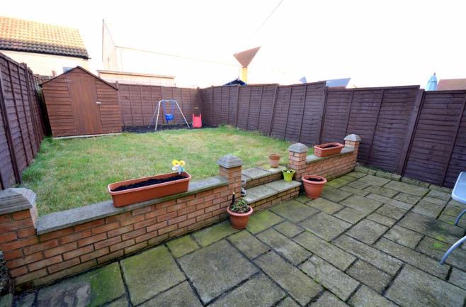 EXTERNAL Externally to the front this property has a small lawn area as well as two separate allocated parking bays, whilst