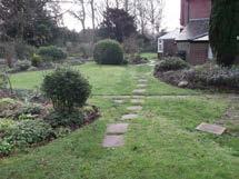 The paths are a mixture of crazy paving as in the above photo, paving slabs laid