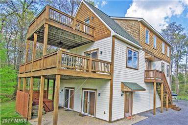 House is on the right. 2342 TURKEY NECK RD, SWANTON, MD 21561 List Price: $439,900 Own: Fee Simple, Sale Total Taxes: $2,211 MLS#: GA10022923 Adv. Sub: SOUTH WOODS ADC Map: 0 Style: Log Home Acre: 1.