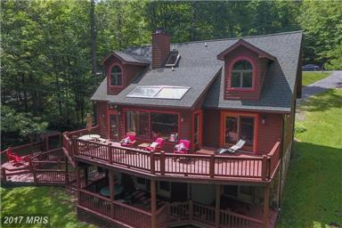 403 PINNACLE DRIVE, SWANTON, MD 21561 List Price: $539,000 Own: Fee Simple, Sale Total Taxes: $5,266 MLS#: GA9694450 Adv. Sub: THE PINNACLE ADC Map: 0 Type: Vacation Home Style: Log Home Acre: 1.