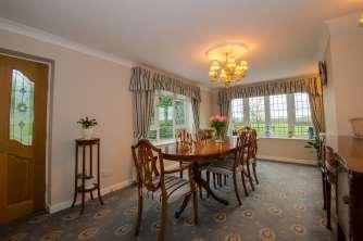 The separate FAMILY ROOM benefits from UPVC double glazed windows overlooking the gardens and paddocks.