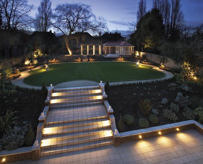 The Stunning Rear Garden at dusk Gardens The substantial and secluded rear garden has been professionally landscaped.