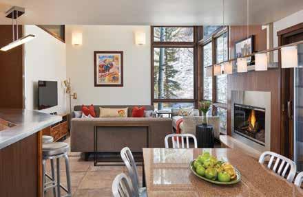 5 feet on the main floor creating drama that is topped only by the jaw-dropping views of Aspen and Shadow Mountains framed by tall windows in the living room.