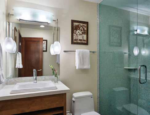 The handsomely elegant décor is complemented by the amazing Master bath complete with Atomi mosaic tile in various shades of sage, a jetted tub, and oversized shower with rain shower head.