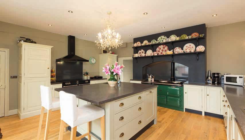 The kitchen is a central feature of the house and has a large central island, a 4 door AGA, a Stoves Range cooker, a good number of
