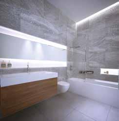 stainless steel towel rails Mirrored cabinets with anti-fog pads behind glass Variety of floor and wall finishes, all with underfloor heating, shelves with integrated lighting, cove lighting, task