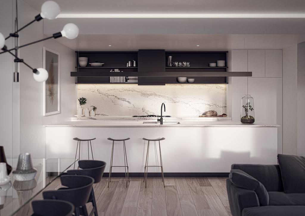 Elegant dining Kitchens are designed with a minimal aesthetic, from the integrated fridge to the long, single pendant light.