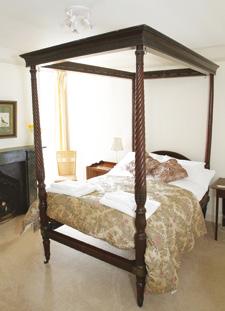 On the top landing is the substantial master bedroom with its bay window overlooking the garden, and en suite