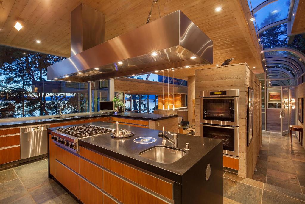 The residence of over 5,500 square feet, originally constructed in 1978, has undergone a multi-million dollar renovation, with upgrades completed in 2008 that were designed by renowned architect Dan