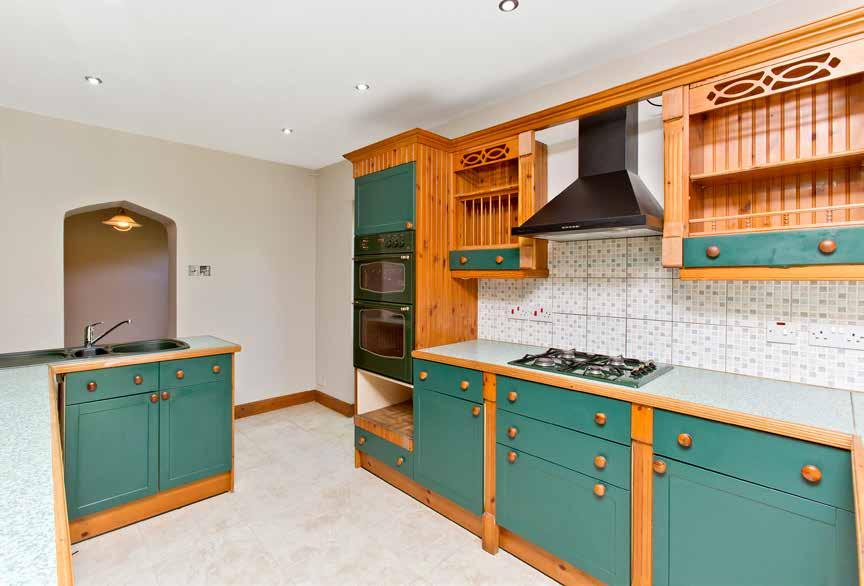 kitchen provides extensive fitted storage and