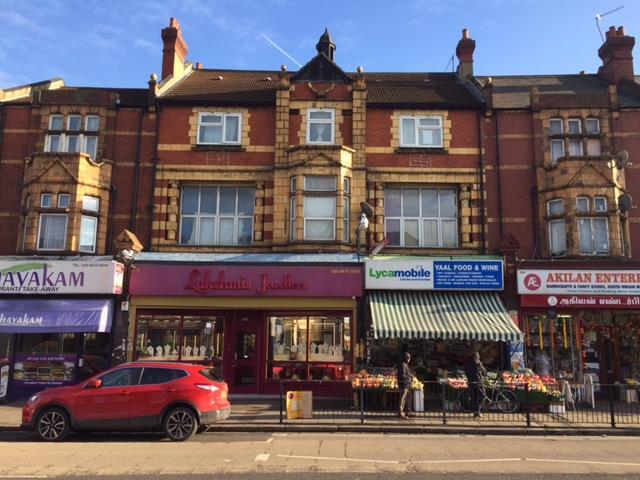 FREEHOLD INVESTMENT FOR SALE 2 SHOPS & 4 SELF-CONTAINED THREE BEDROOM FLATS Immediate Scope for Rental Increases & Development