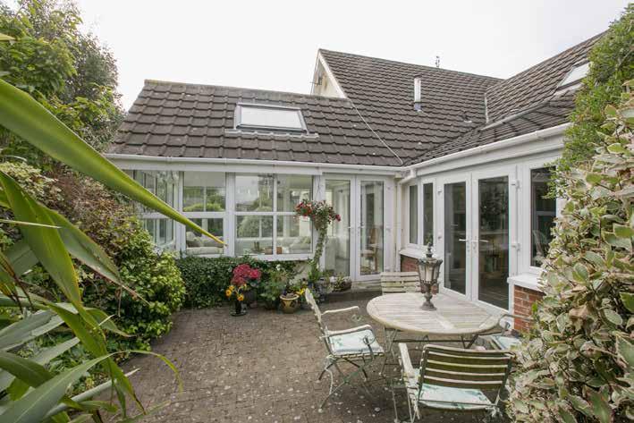 Large family home in quiet cul-de-sac Deceptive, extended accommodation set over 2 floors Entrance hall with cloakroom and WC Drawing room with wooden floor, fireplace and bay window Family room with