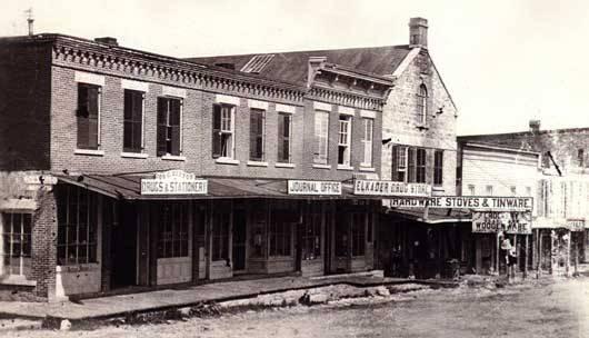 Photograph Collection); bottom current at 109 South Main Street, before cornice