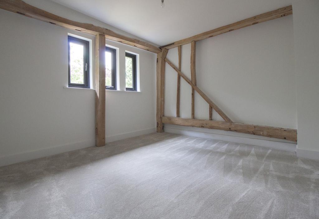 galleried second floor landing 2 further double bedrooms e- suite shower room (2) - block paved driveway double oak framed open sided cart lodge landscaped rear garden -gas fired central heating