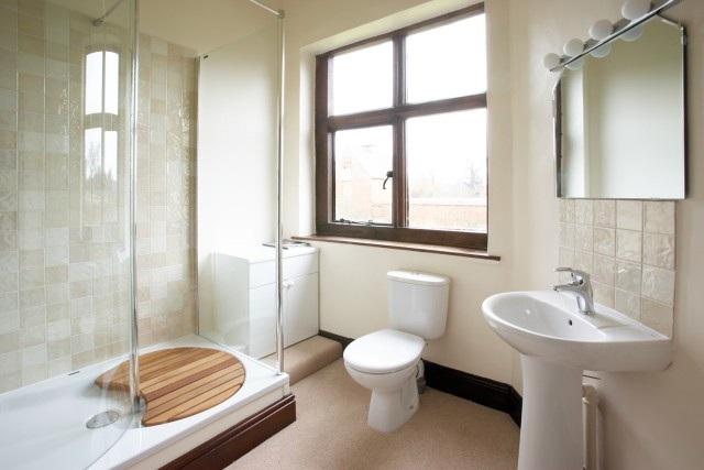 Shower Room Comprising shower, w.c. and wash hand basin Third Bedroom with en-suite 4.1m x 5.4m (13.4ft x 17.7ft) Fitted wardrobe and windows overlooking Packington Park.
