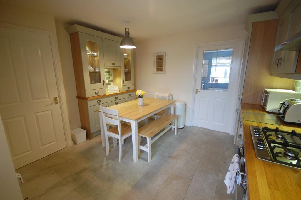 45m) Laminate flooring, double radiator, useful storage cupboard and UPVC double doors leading to the garden. KITCHEN/DINING ROOM 13' 08" x 11' 06" (4.17m x 3.