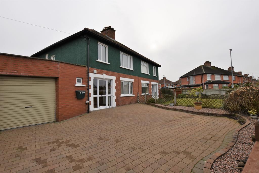 A superb semi- detached property located in the heart of Dundonald Bright and spacious reception hall with solid wooden flooring Lounge with solid wooden flooring Family room open plan to dining room