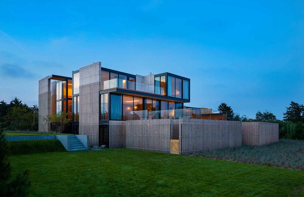 NOW COMPLETE AND MOVE-IN READY, THIS MODERN MARVEL BY THE AWARD-WINNING BATES + MASI ARCHITECTS IS SET ON ONE OF THE
