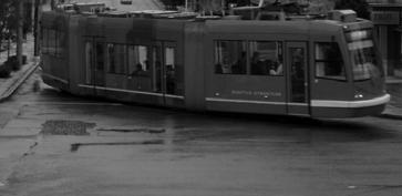Running above ground, streetcars are visible and offer residents