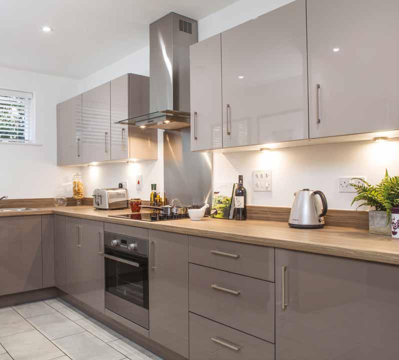 SPECIFICATIO Erith Baths Modern kitchen cabinets with a complementary worktop and matching upstand Under cupboard lighting Stainless steel kitchen sink Chrome mixer tap Fully integrated kitchen