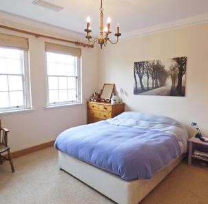 Bedroom 3 Sash window with views over St Leonards playing fields and beyond to the pier and sea. Cornice.