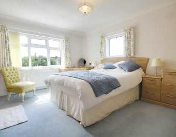 with superb views, kitchen/breakfast room, cloakroom,