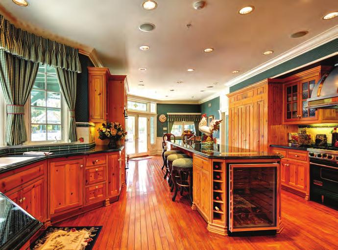 entertaining. Gracious formal dining room, family room and formal living room. Spectacular craftsmanship and quality.