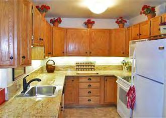 .. Upgrades include new granite slab counters, newer flooring, new interior paint,