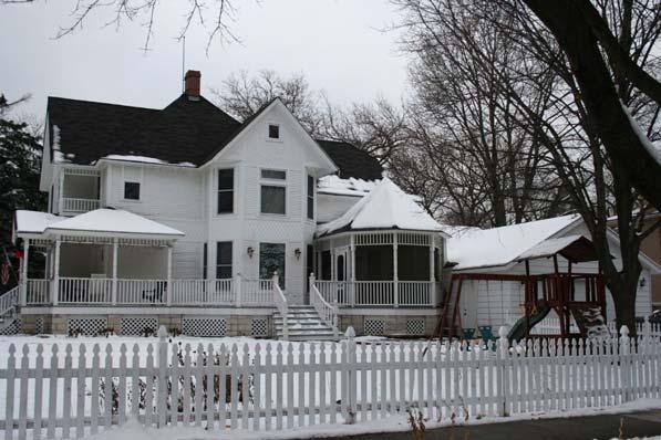front and east sidewalks; rear driveway; wood picket fence; similar