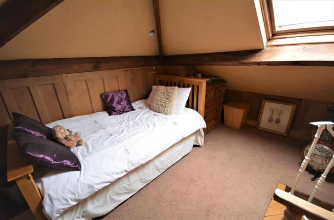 49m (11' 5") The second bedroom is another double bedroom, also containing a spiral staircase leading to the attic room.
