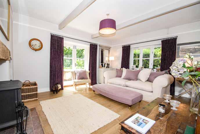 Situation A stunning and character filled family house, elegantly presented and boasting glorious south facing landscaped gardens and glimpses of the Downs Church Cottage is nestled in the Hamlet of