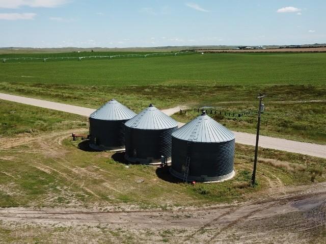 The farm and surrounding area is known for their production of corn, potatoes, dry edible beans, wheat and sugar beets. The wells and pivots are powered by electricity.
