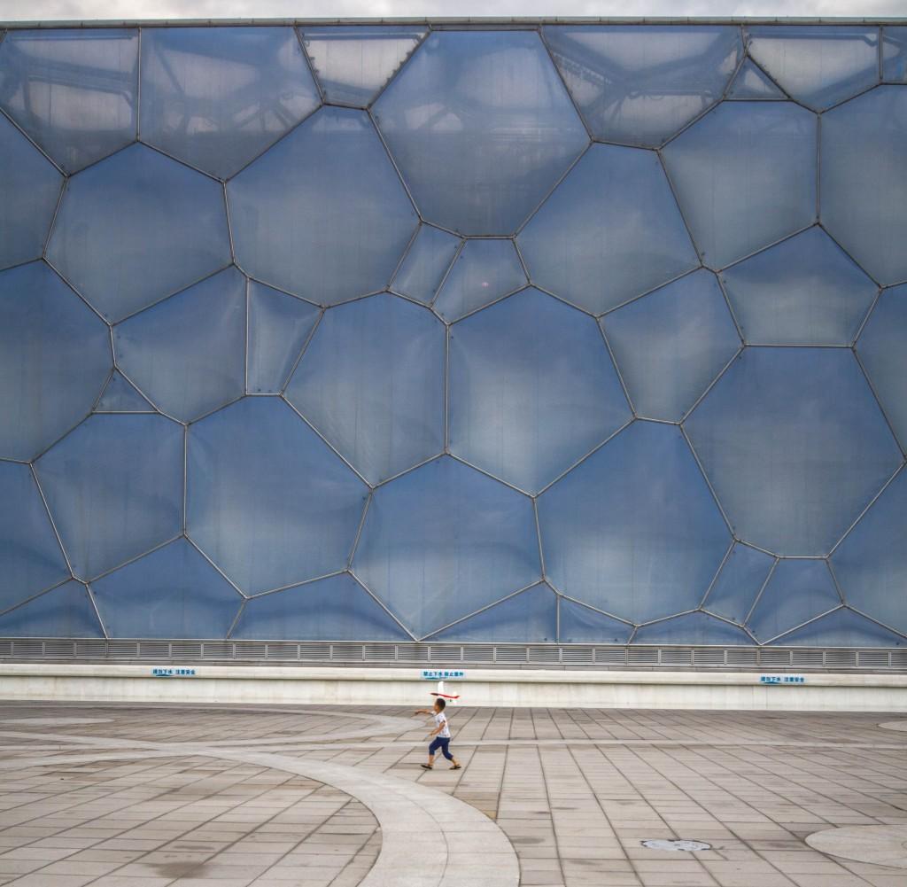 The exterior is covered with a membrane made of an advanced material known as ethylene-tetra-fluoro-ethylene, or ETFE The Water Cube uses more than 100,000 sq m of ETFE, making it the world's largest