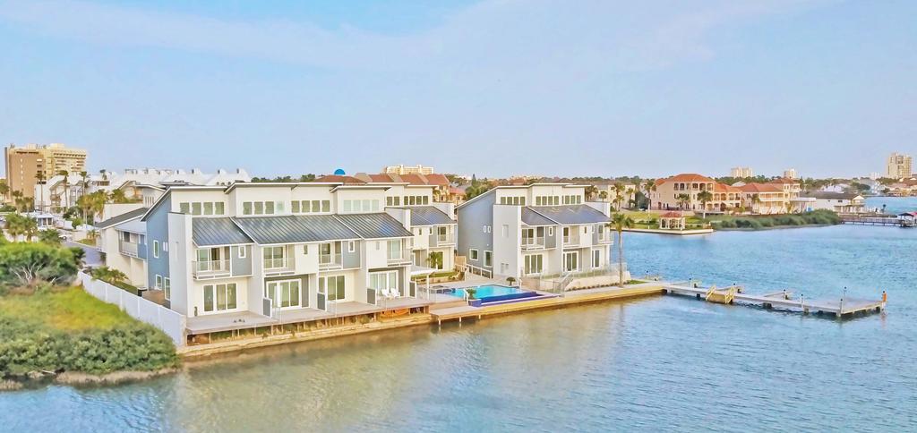 EXPLORE The Possibilities Beautiful, gated, Bayfront, townhome style condominiums, with a contemporary flare.