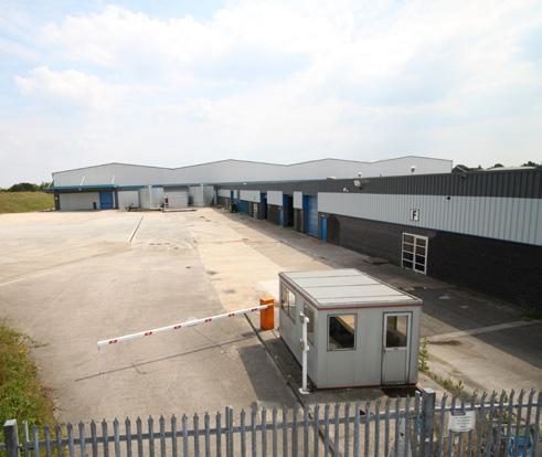 Description Description The property comprises a single storey industrial complex of steel frame construction with brick elevations and an insulated steel clad roof.