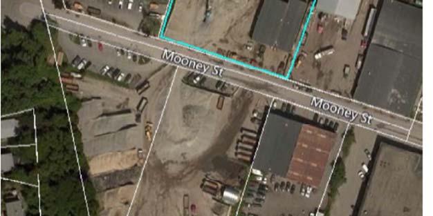 The owner is an excavation company that owns a number of properties on Mooney Street.