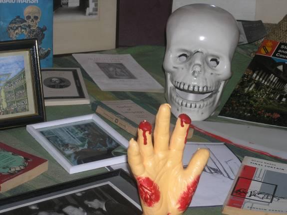 hands and skulls intermingle with copies of Ngaio s crime novels, paintings and photographs, and scripts for plays.