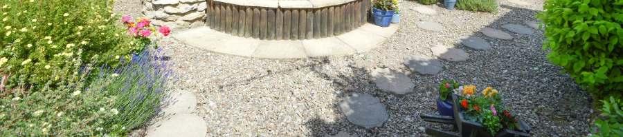 landscaped and includes a fish pond, a