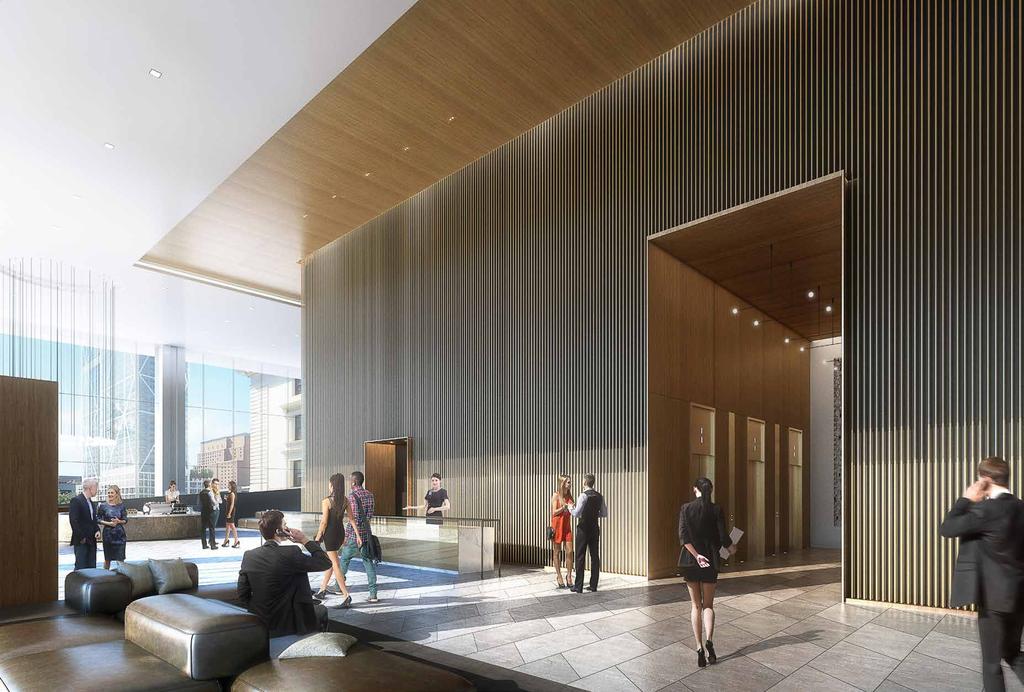 AN IMPRESSIVE ENTRANCE OFFICE SPACE REIMAGINED 30 ceilings to create an open, inviting experience.