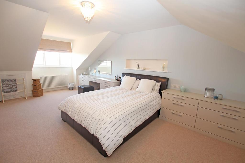 Master bedroom 21 7 x 13 3 Fabulous range of fitted wardrobes, drawer and dressing table units, large dormer window with partial