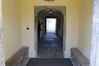During opening hours the door is permanently open. 5. To access the house there is a door at 90 degrees to the entrance which is 880mm wide; volunteers are on hand to assist with access. 6.
