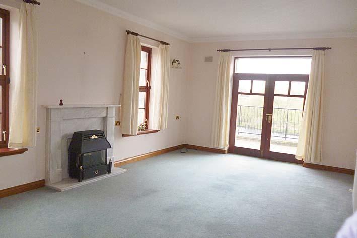 Sitting Room 23 00 x 13 01 Large bright sitting room with Patio doors to paved area overlooking the