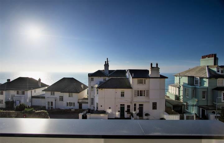 vaulted ceiling and with fully glazed gable end with stunning sea views.